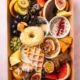 Vegetarische süße Brunch Box aus Wien mit Donuts, Waffeln, Müsli, frischem Obst, Nüssen und Aufstrichen – perfekt für Frühstück, Brunch oder Geschenkideen.